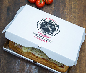 Southdown pizza box with pizza in it